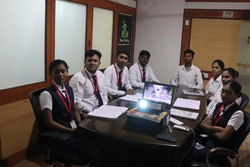 IESP students in uniform around the table in the Andheri East classroom